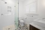 Ensuite bathroom with a glass walk in shower 